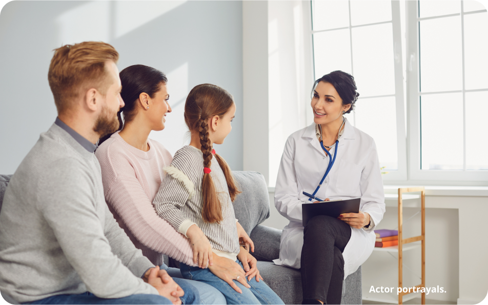 Doctor talking to a family